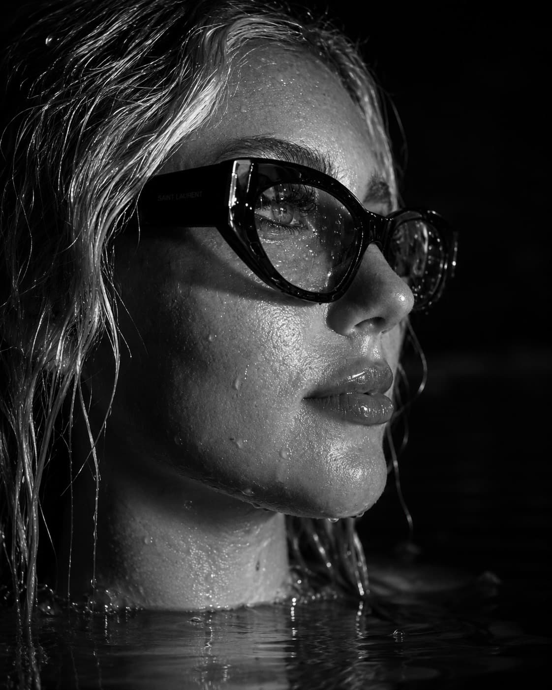 Editorial portrait of a model wearing luxury designer eyewear at Domiano Eye Care boutique